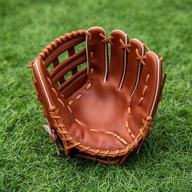 茶色の内野手用野球グローブを芝生の上で開いた商品写真